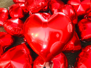 Add a red heart shaped helium balloon to your basket!